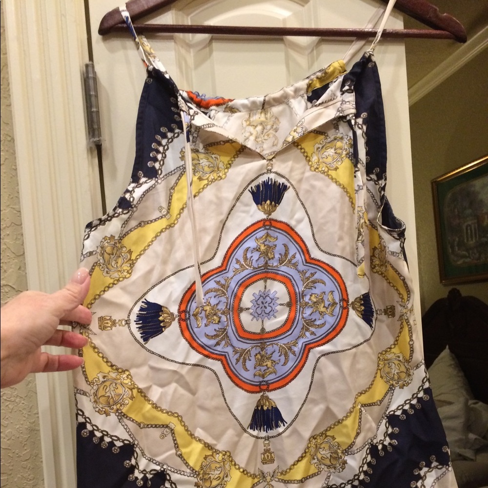 100% silk sleeveless top.